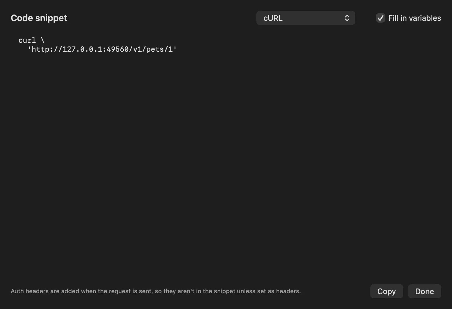 The Code snippet sheet with cURL selected, Fill in variables checked, a two-line curl command for a pets URL, the note that auth headers aren't in the snippet, and Copy and Done buttons