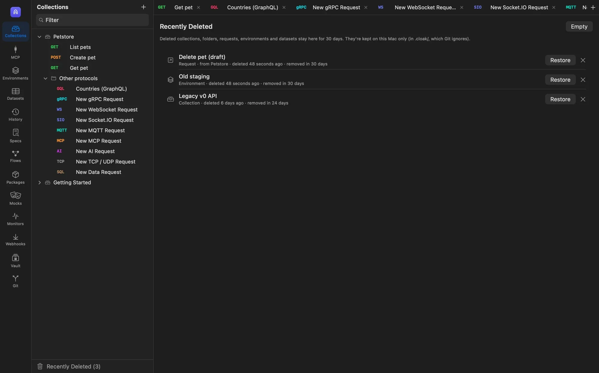 The Recently Deleted tab listing a request deleted from Petstore, an environment called Old staging and a collection called Legacy v0 API, each with a Restore button and a delete button